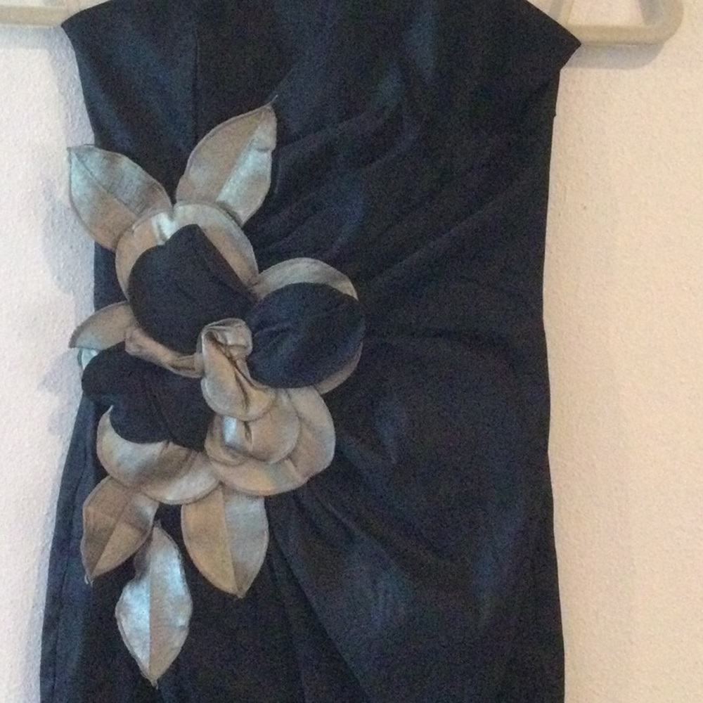 Black strapless size 4 cute mini dress. Great for a special occasion. - Picture 2 of 4